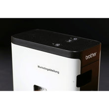 Load image into Gallery viewer, Brother Genuine TZE-121 Labelling Tape for P-Touch label Printers - Black on Clear, 9mm wide.
